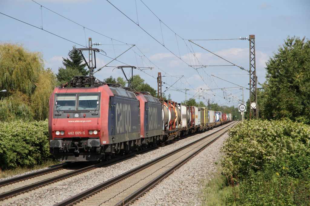 SBB Cargo Class 482 TRAXX locos haul a freight train over the route in September, 2016.
